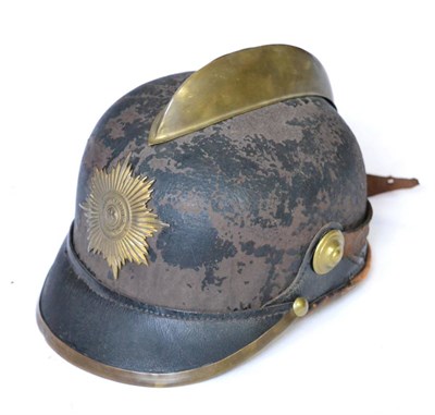 Lot 201 - A Prussian Fireman's Type Leather Helmet, with brass comb, garter star helmet plate embossed...