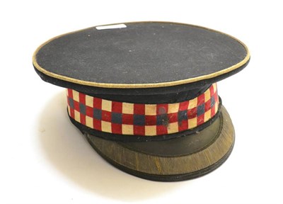 Lot 208 - A First World War No.1 Service Cap to an Officer of the Scots Guards, with chequered hat band, gilt