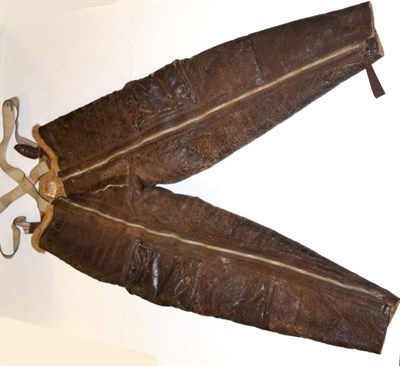 Lot 224 - A Pair of Second World War Irving Flying Trousers, in brown leather lined with sheepskin, side...