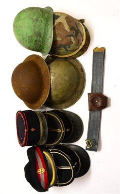 Lot 232 - A Collection of Hats and Part Uniforms, mainly Second World War, including two Brodie helmet...