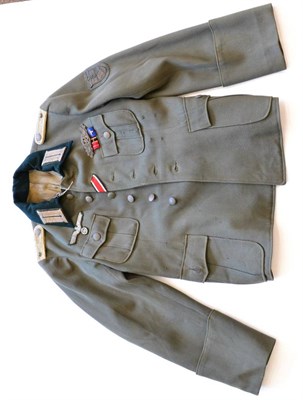 Lot 259 - A German Third Reich Infantry Officer's Field Tunic, in field grey whipcord, with rayon lining...