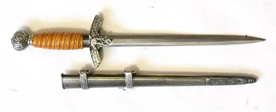 Lot 267 - A German Third Reich Luftwaffe Dagger, Second Pattern, the steel blade etched with maker's name...