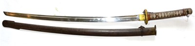 Lot 282 - A Second World War Japanese Type 95 NCO's Katana, the 67cm single edge fullered steel blade stamped