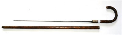 Lot 291 - A George V Partridge Cane Sword Stick, the 59.5cm square tapering steel blade stamped SOLINGEN, the