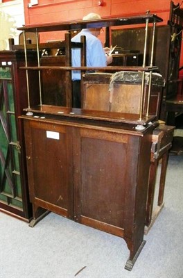 Lot 677 - A 19th Century Mahogany Glazed Gun Cabinet; A Carved Mahogany Double-Door Cabinet, carved with...