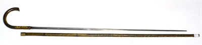 Lot 324 - A 19th Century Japanned Steel Swordstick, the 67cm single edge slender fullered steel blade...