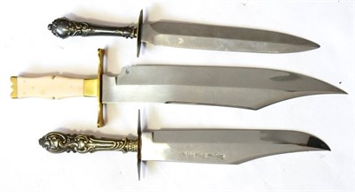 Lot 347 - A Bowie Knife, with 31cm clip-point steel blade, brass crossguard and shaped grip with ivory...