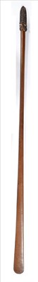 Lot 372 - A Maori Taiaha, the long flat blade (ate) widening towards the tip, the dark stained head...