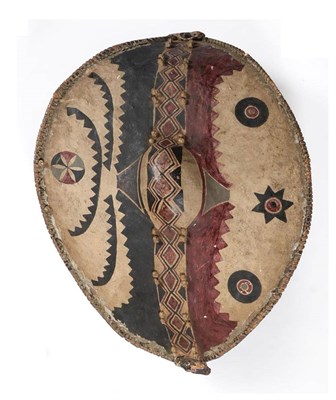 Lot 398 - A Good Masai Hide Sirata (Shield), of bowed navette form, the fascia with a central band...