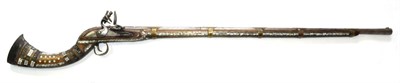 Lot 521 - A 19th Century Afghan Jezail, the 98.5cm steel barrel fluted at the breech and muzzle, with...