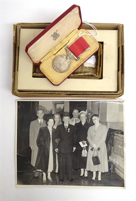 Lot 30 - A British Empire Medal, Queen Elizabeth II, to Albert G. Cooke, in original case and box of...