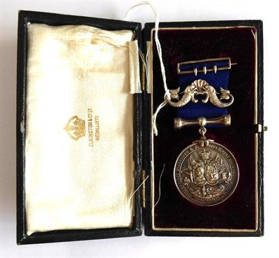 Lot 42 - A Shipwrecked Fishermen and Mariner's Royal Benevolent Society Medal, with dolphin suspender...