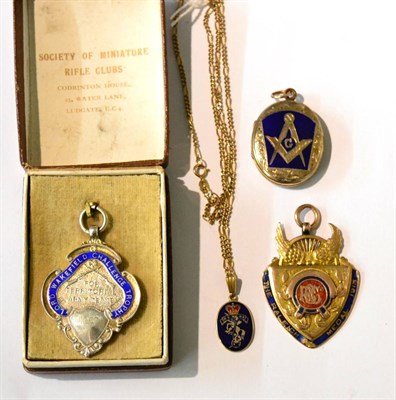 Lot 69 - A 9 Carat Gold and Enamel REME Sweetheart Pendant, with fine chain, 4.8gms; a 9 Carat Gold and...