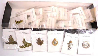 Lot 81 - A Collection of Twenty Two Service Corps Cap Badges, in brass, white metal and bimetal, on...