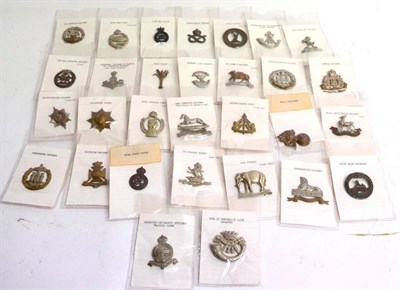 Lot 83 - A Collection of Thirty Cap Badges, including Cavalry and Line regiments, in bronze, white metal and