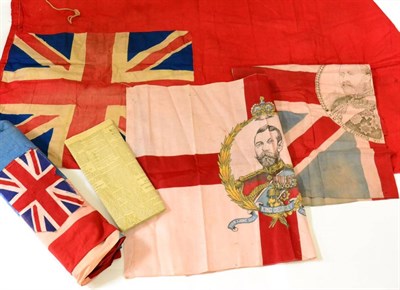 Lot 123 - An Edwardian Union Jack, in printed cotton, 212cm by 167cm; a British Red Ensign, in printed...