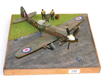 Lot 142 - A Kit Built Model of a Spitfire, on a wood base modelled as tarmac and grass, with three airmen and