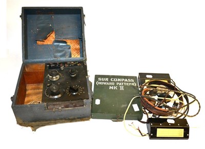 Lot 143 - A Sun Compass (Howard Pattern) Mk.II, in original case; a W.T. Field Set Mk.III C.W. Receiver, with