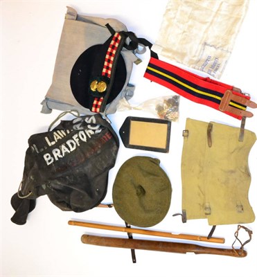 Lot 166 - Militaria, including a glengarry, a tam o'shanter, buttons, badges, kit bag, canvas satchel, a...