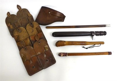 Lot 194 - A Small Quantity of Militaria, comprising a Victorian malacca cosh with leather covered lead...