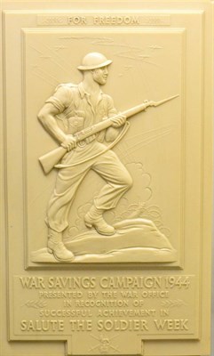 Lot 211 - A Second World War Cream Bakelite War Savings Campaign 1944 Wall Plaque, of vertical...