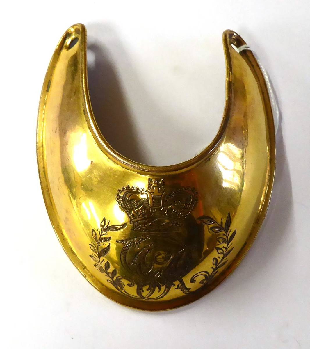 Lot 221 - A George III Gilt Copper Gorget, of typical crescent form, with folded edges, engraved with crowned