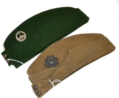 Lot 248 - A Second World War Officer's Forage Cap to the Cheshire Regiment, in khaki with bronze badge...