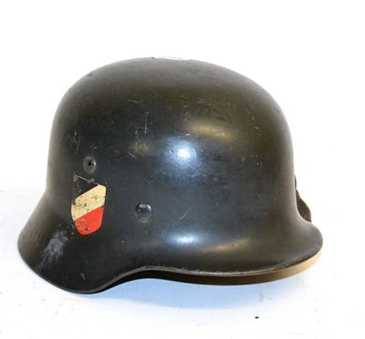 Lot 274 - A German Third Reich Luftwaffe M35 Pattern Helmet, bearing double decals of eagle and swastika...