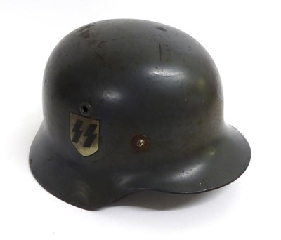 Lot 278 - A German Third Reich M35 Helmet, with grey painted finish, later SS decal and mark to the right...