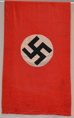 Lot 283 - A German Third Reich NSDAP Linen Flag, with printed roundel and swastika, the hoist stencilled...