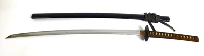 Lot 321 - A Japanese Katana, Shinto,  the 70cm blade with undulating hamon, one piece copper habaki, the tang