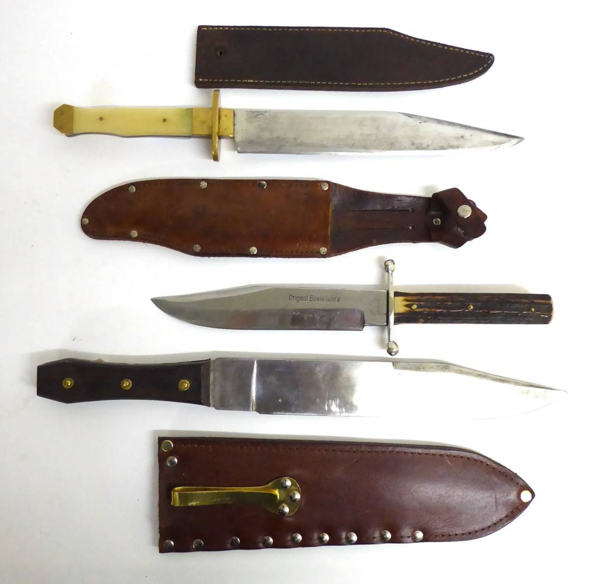 Lot 335 - A Bowie Knife, with single edge clip point steel blade stamped Loffe, Solingen, Germany, plated...