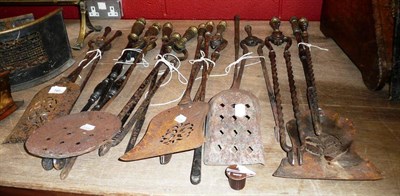 Lot 740 - Sixteen 19th Century Brass Fire Implements (rusted)