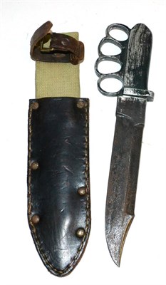 Lot 404 - A Knuckleduster Trench Knife, with 18.5cm clip-point steel blade, green painted white metal...