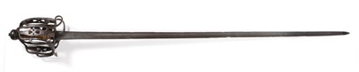 Lot 405 - A 17th Century Basket Hilt Back Sword, the 102cm single edge steel blade with a broad fuller...