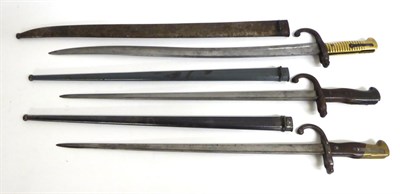 Lot 415 - A French Model 1866 Chassepot Yataghan Sword Bayonet, the back edge of the blade engraved and dated