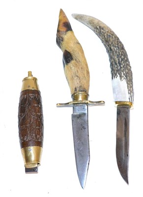 Lot 426 - A Swedish Barrel Knife, the 8cm blade folding into the brass casing inserted into the the leaf...