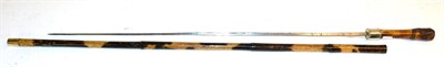 Lot 428 - A 19th Century Bamboo Swordstick, the 66cm diamond section steel blade with facet chip...