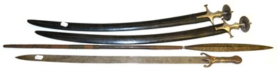 Lot 430 - Two 19th Century Indian Talwars, each with curved steel blade, steel cruciform hilt with disc...