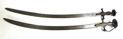 Lot 438 - An Early 19th Century Indian Talwar, the 83.5cm single edge slightly curved steel blade narrow...