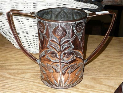 Lot 744 - A Two-Handled Copper Embossed Vessel, in the manner of Keswick School