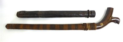 Lot 444 - A 19th Century Kiakava (Gunstock) War Club, of dense hard wood, the shaped head with chamfered back