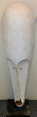 Lot 457 - A Fang (North Gabon) Ngil-Type Carved and Painted Wood Mask, of elongated form, with...