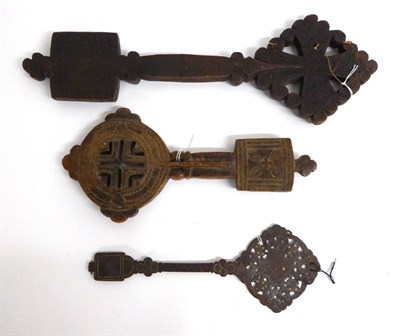 Lot 458 - A Late 18th Century Ethiopian Wood Processional Cross, all over carved with diapering and bands...