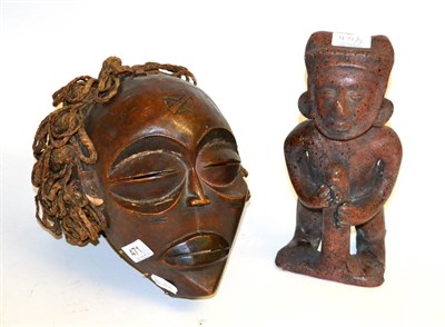 Lot 471 - A Chokwe Pwo Wood Mask, with plaited and coiled raffia coiffure, scarified domed forehead,...