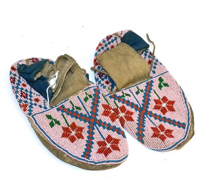 Lot 474 - A Pair of Native North American Beaded Hide Moccasins, possibly Woodlands Indians, the uppers...