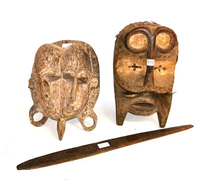 Lot 475 - A Bete, Ivory Coast Wood Mask, with bar nose looping up to form the eyebrows, recessed slit...