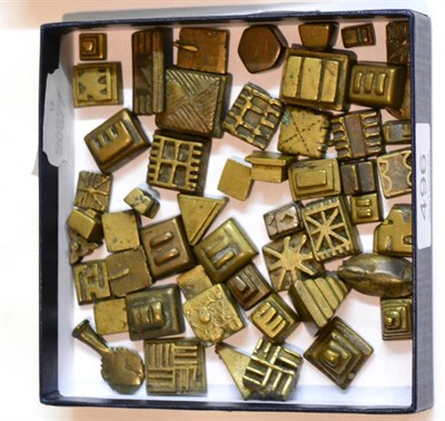 Lot 496 - A Collection of Fifty Two Ashanti Brass Gold Weights, West Africa, of assorted designs...