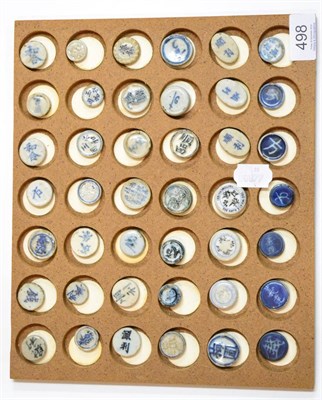 Lot 498 - A Collection of Forty Two Chinese Porcelain Gaming Tokens, blue and white, oval and circular,...