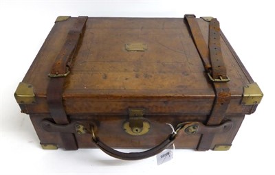 Lot 528 - A Late Victorian Leather-Covered and Brass-Bound Oak Cartridge Case, the hinged lid centred by...